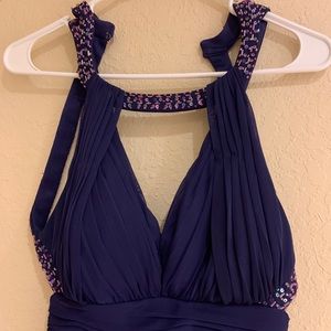 Beautiful social dresses size 2 and 4.